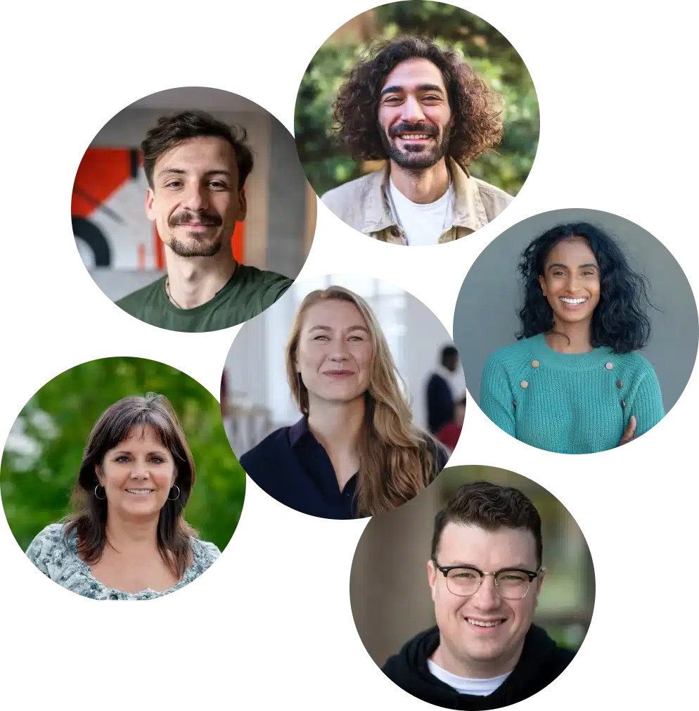 Gruppenzusammenkunft von sechs Menschen, die nach einem Job Coaching Berlin suchen.